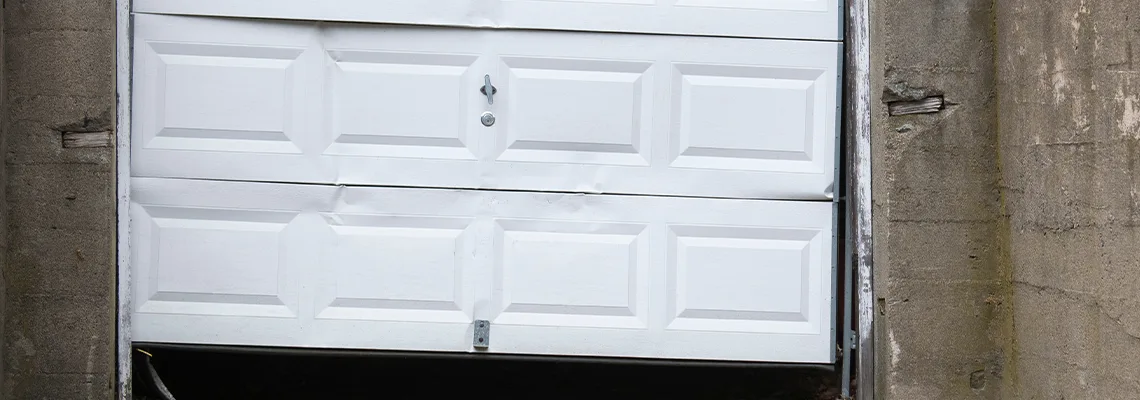 Garage Door Got Hit By A Car Dent Removal in Addison, IL